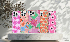 Set of durable flower tough phone cases for iPhone with colorful floral designs and protective sturdy build