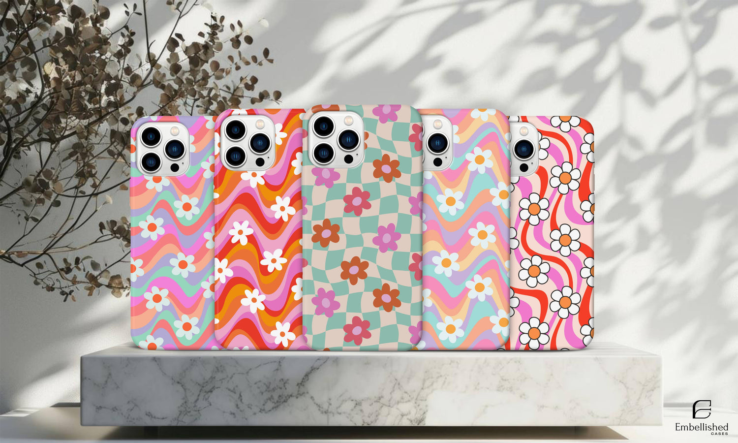 Tough vibrant floral pattern phone cases for iPhone and Samsung with durable shock-absorbing design and colorful glossy finish