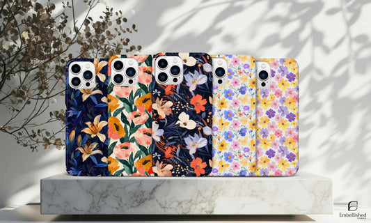 Tough phone cases with colorful floral designs for iPhone and Samsung models, durable impact-resistant protection with glossy finish and shock-absorbing liner.