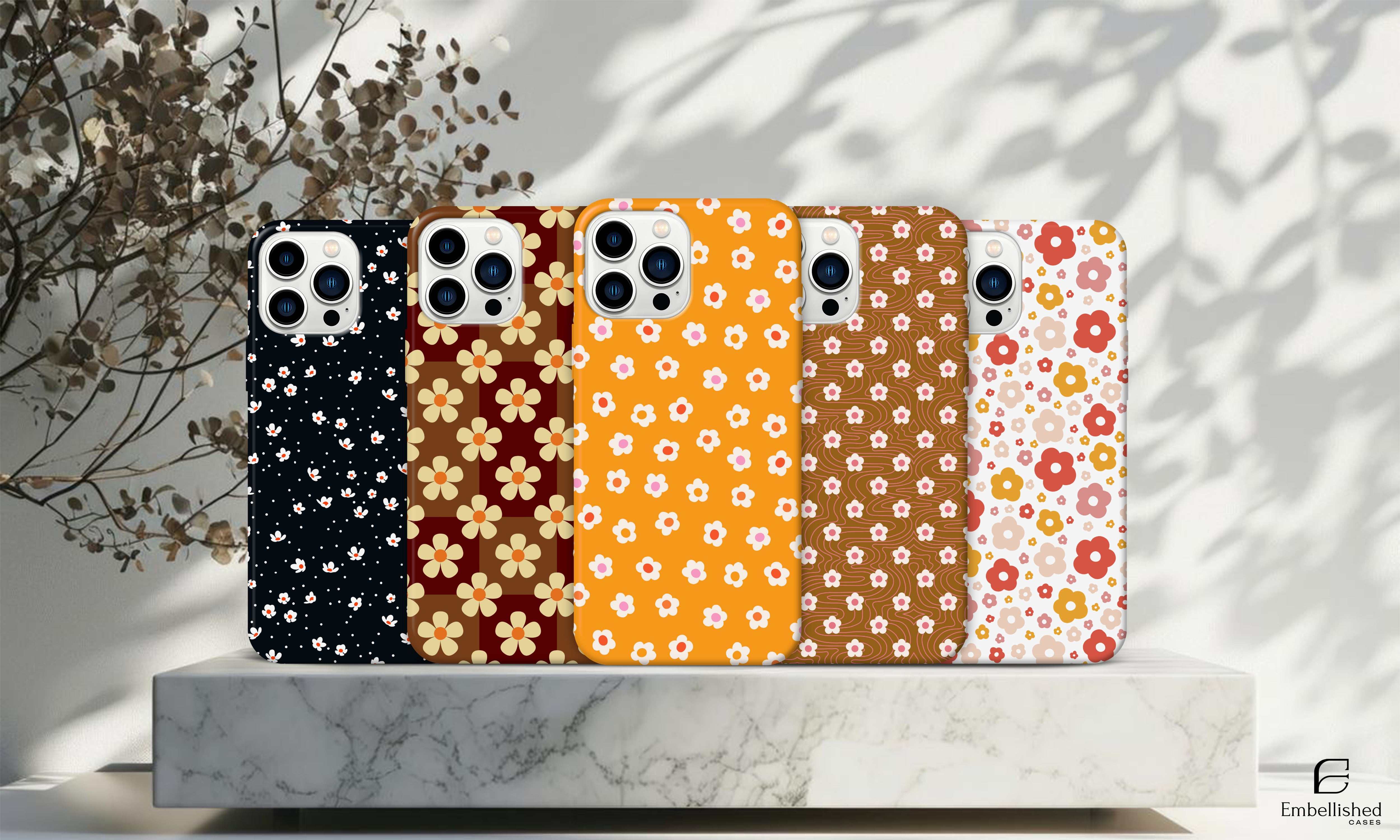 Daisy Flower Phone Case collection with floral patterns and glossy finish for iPhone and Samsung models